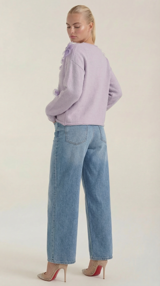 Suéter con diseño floral y escote redondo