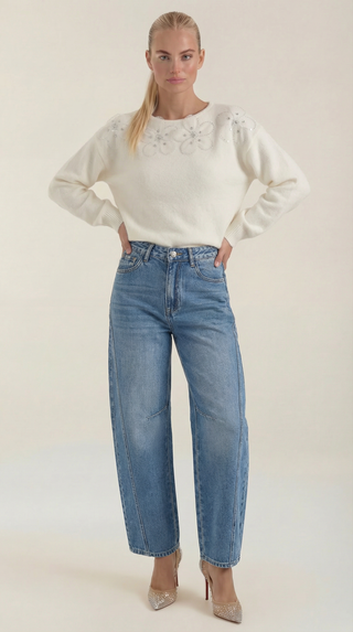 Suéter con diseño floral y escote redondo